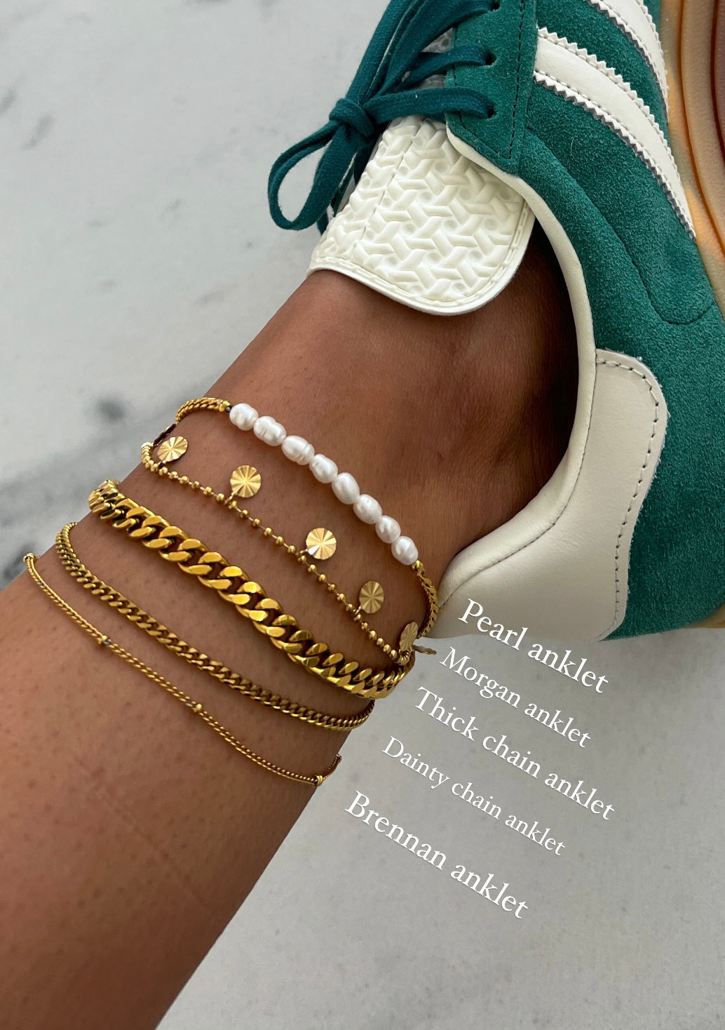 Assorted anklets-one with pearls, one with round dangle shape, thick chain rope and a thin chain rope and very thin rope with gold bead.